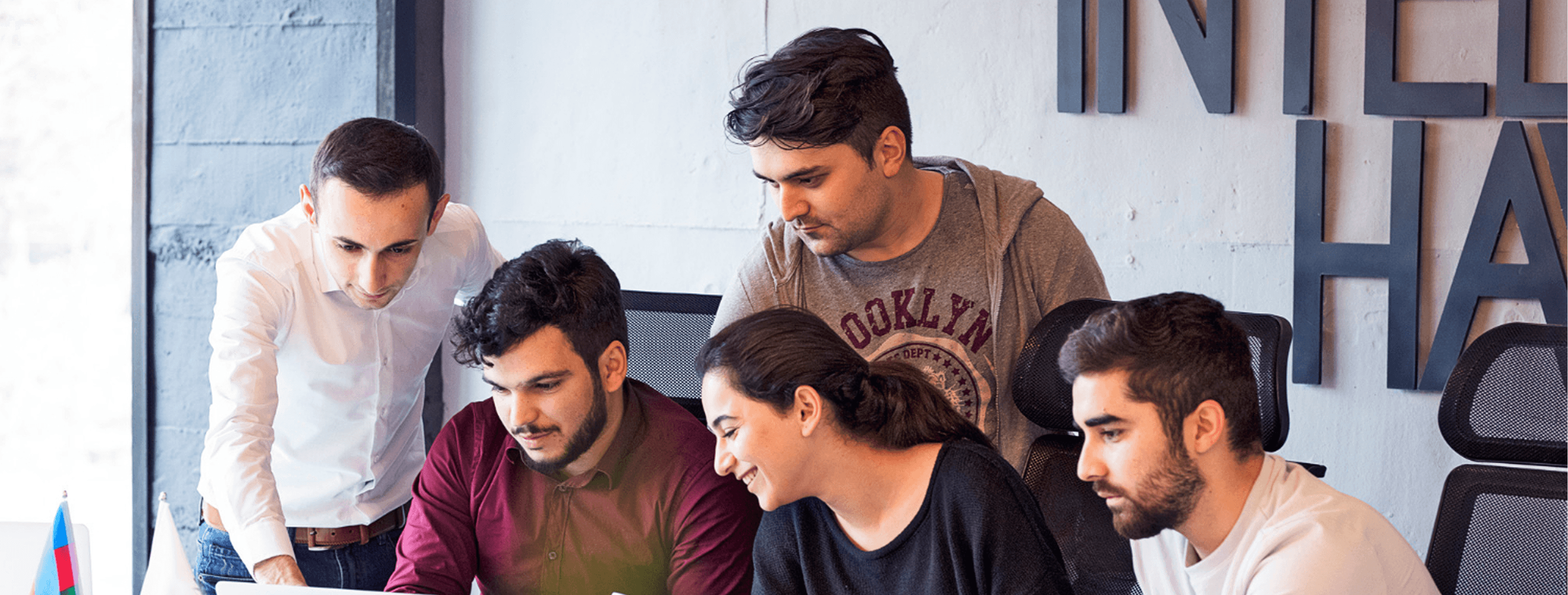 The TechDot team collaborating on a project